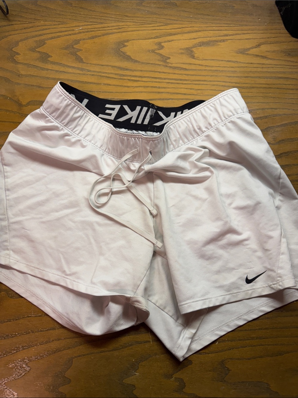 Nike Women’s Pale Pink Athletic Shorts with Black Logo Waistband